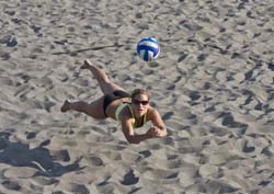 Woman playing volleyball on Alki Beach